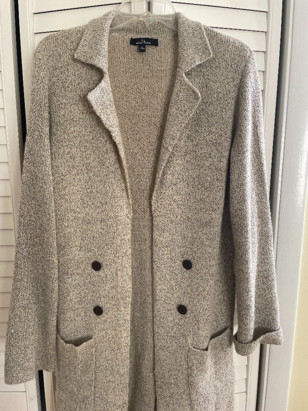 Warm tan long coat. Acrylic. Size XL in good condition